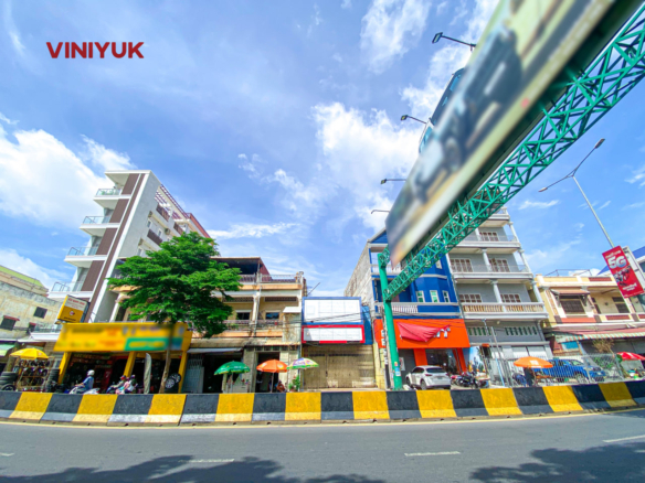 Massive Commercial Warehouse on Bustling Street
